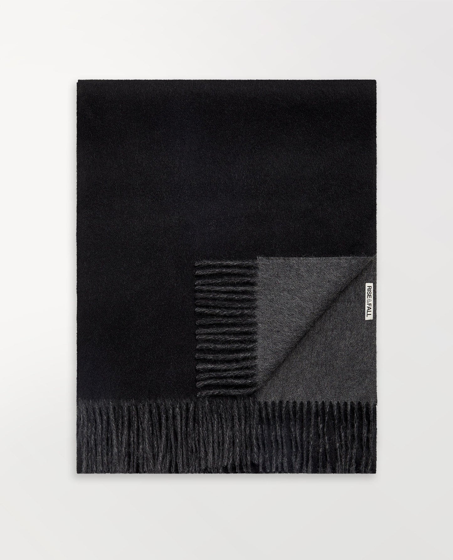 Image 1 of 2 showing Rise & Fall's finest cashmere double faced wrap, colour: black and charcoal.