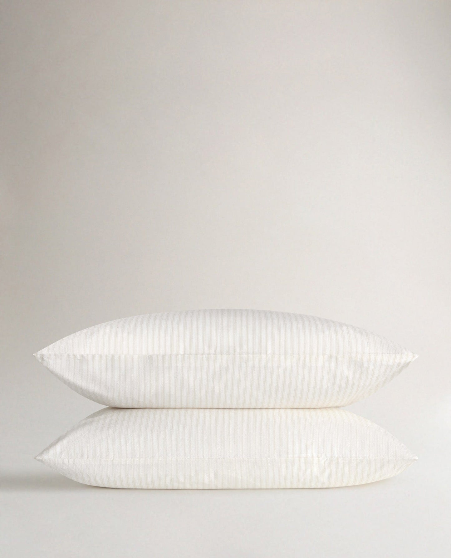 Image 1 of 3 showing Rise & Fall's Crisp & Cool Organic Cotton Pillowcases Set, colour: Buttermilk Ticking Stripe.