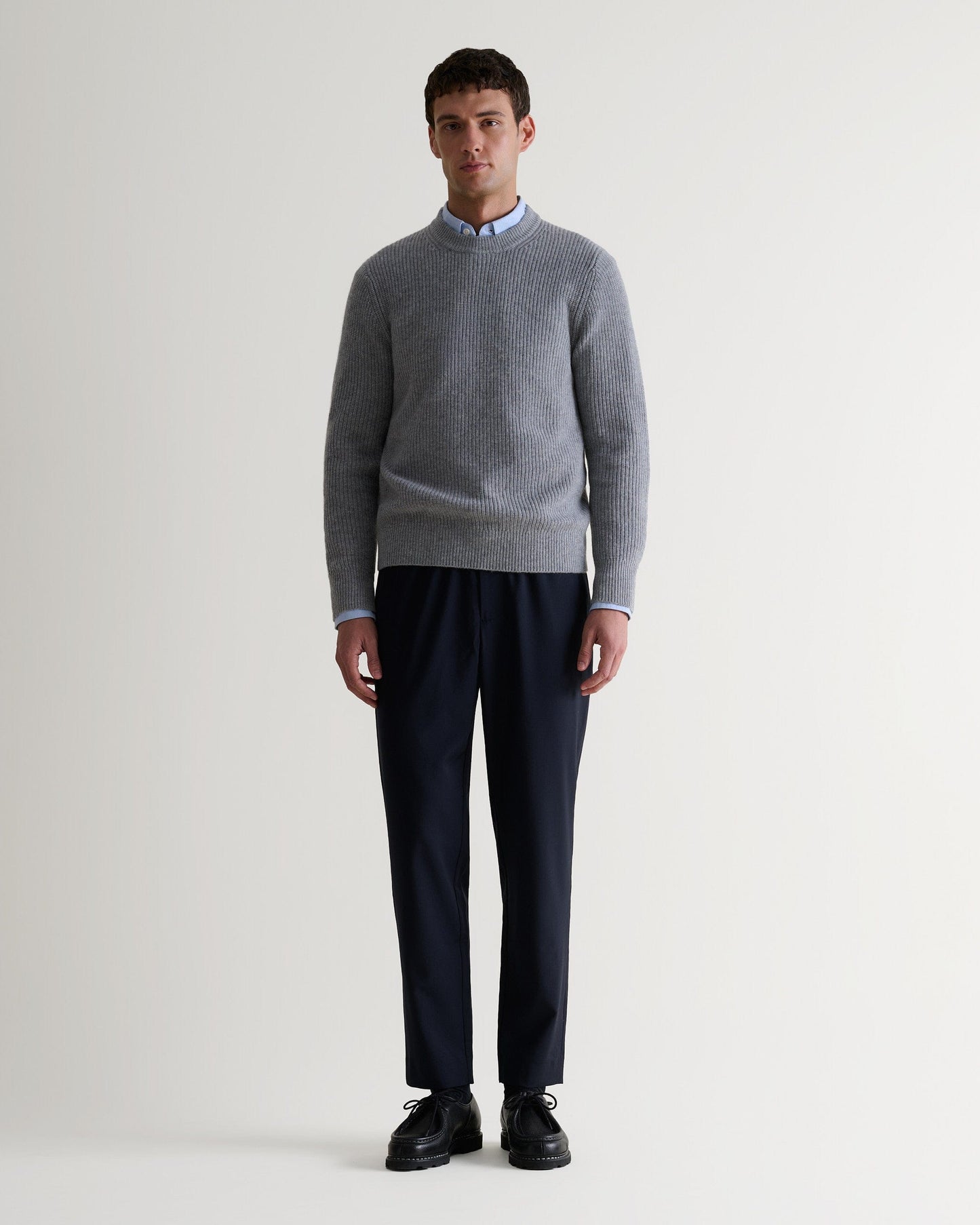 Image 1 of 5 showing man wearing Rise & Fall's Cashmere Merino Fishermans Rib Crew Neck Jumper in grey.