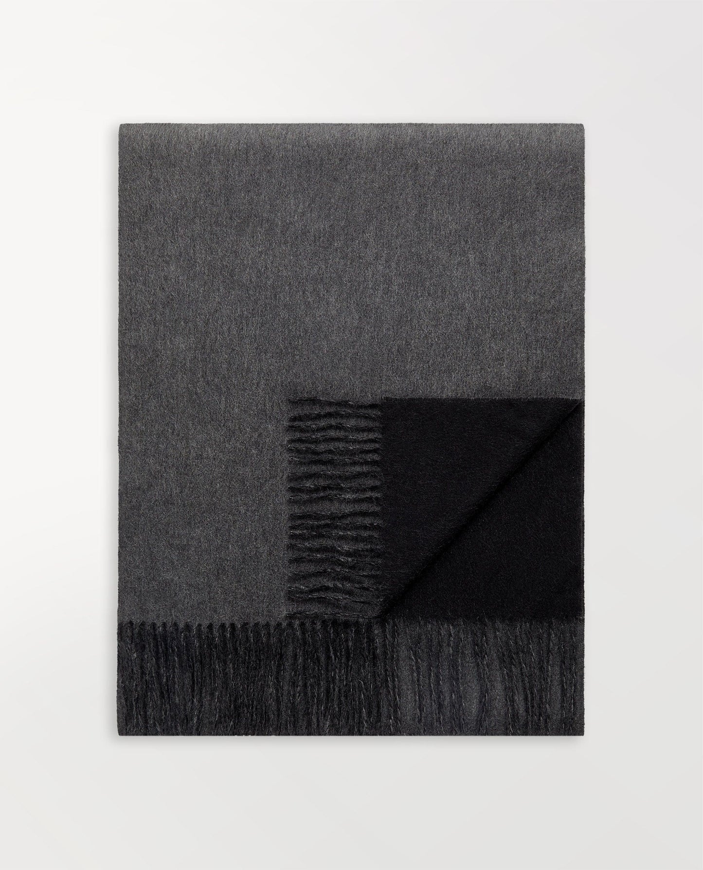 Image 2 of 2 showing Rise & Fall's finest cashmere double faced wrap, colour: charcoal and black.