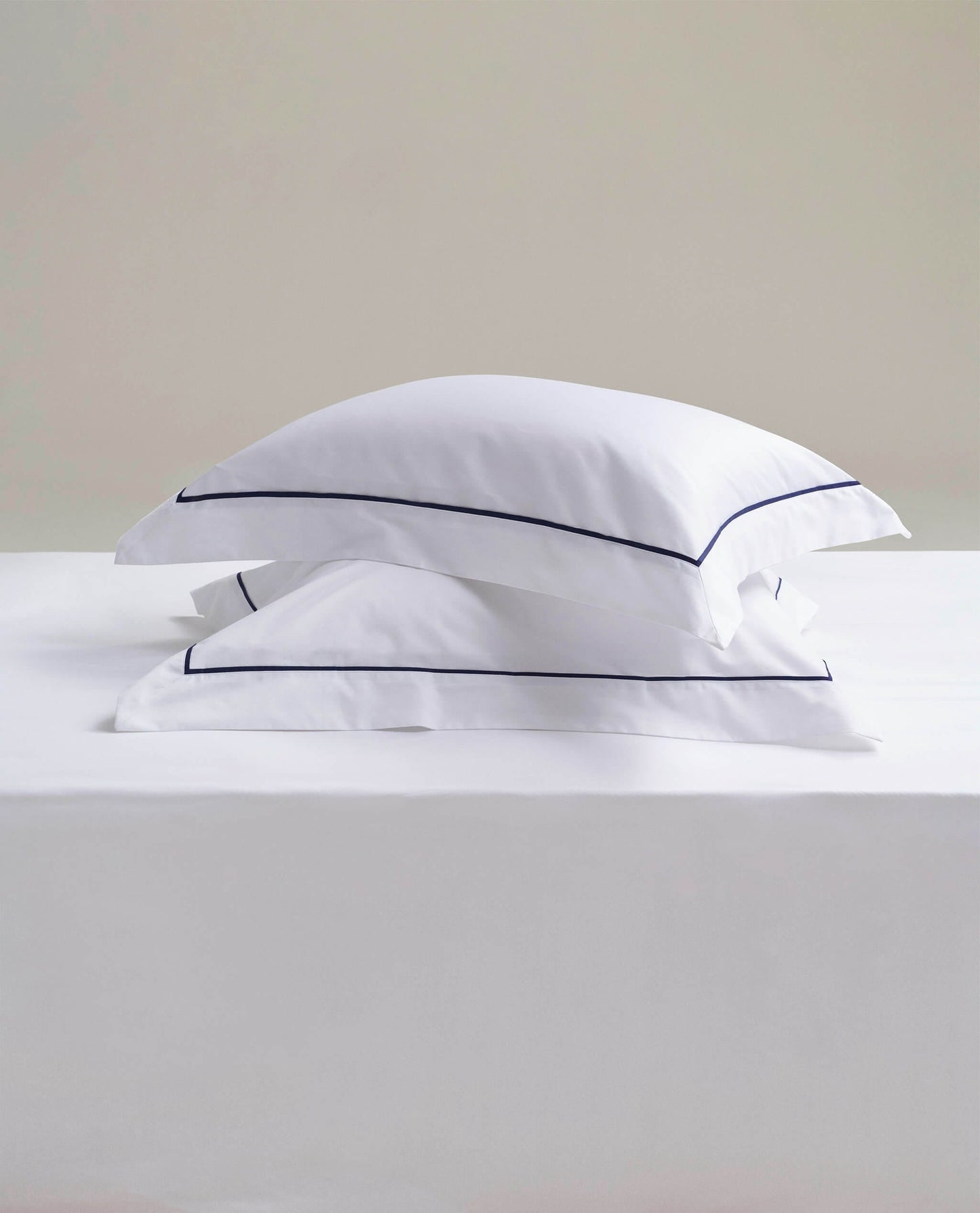 Image 2 of 4 showing Rise & Fall's Crisp & Cool Organic Cotton Oxford Pillowcase Set, colour: white navy piping.