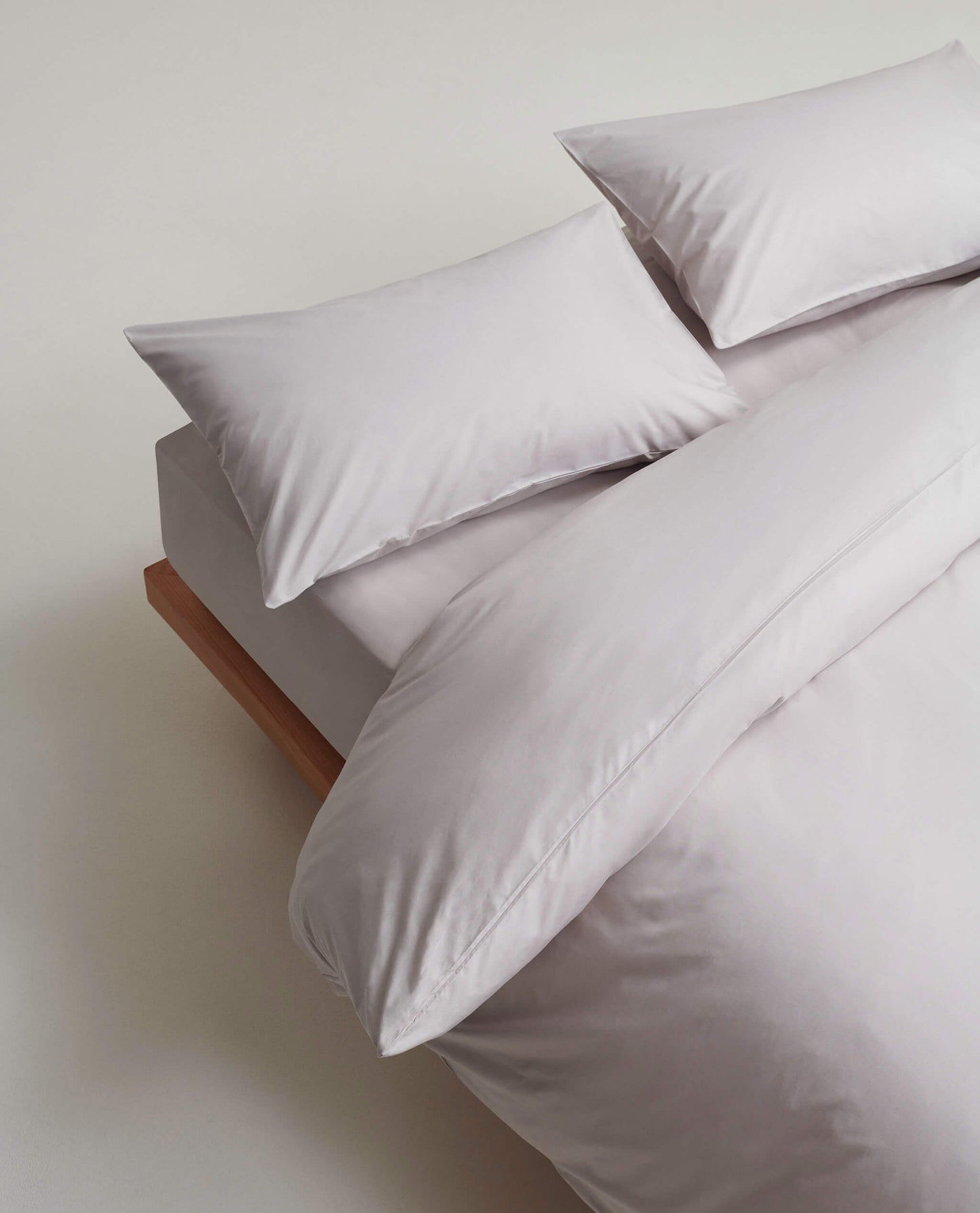 Image 2 of 5 showing Rise & Fall's Soft & Smooth Cotton Sateen Oxford Pillowcase Set in pebble.