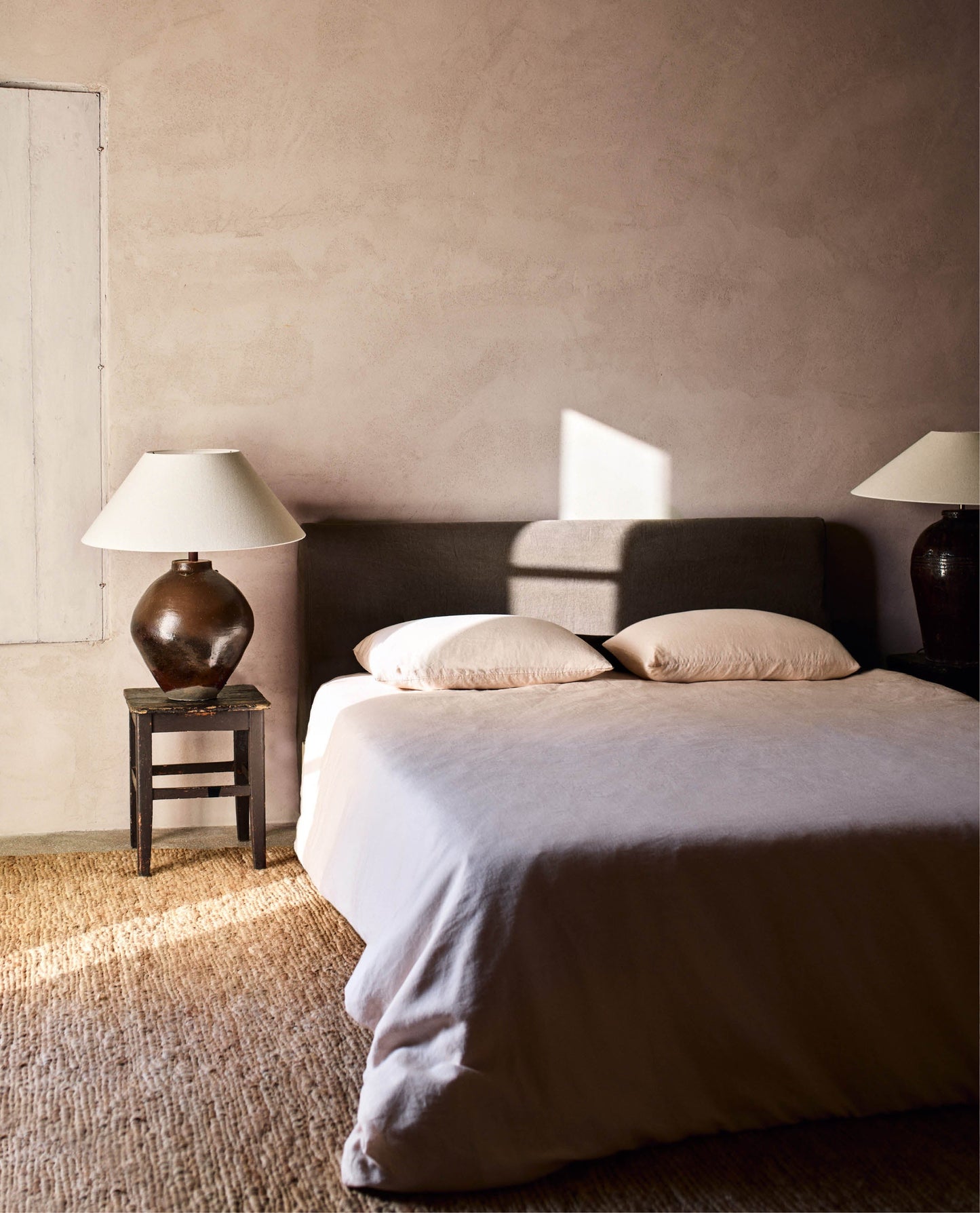 image 2 of 6 showing bed with Rise & Fall's Relaxed & Refined linen duvet set, fabric: European flax, colour: bruised peach