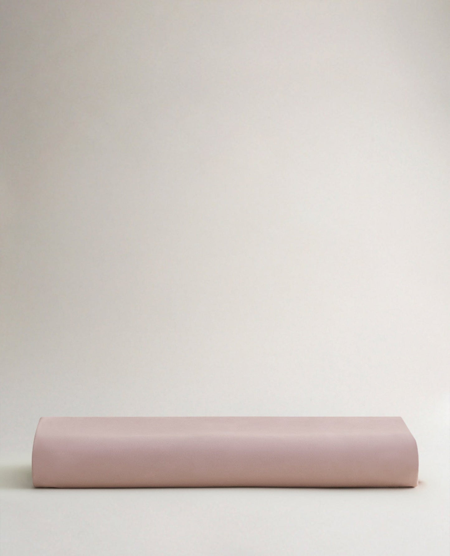 Image 3 of 4 showing Rise & Fall's Soft & Smooth organic sateen cotton flat sheet in deep clay.