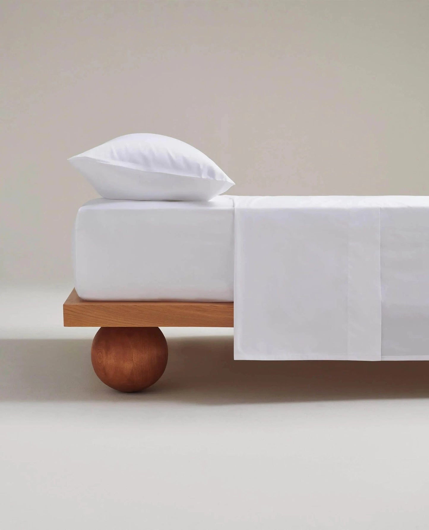 Image 3 of 5 showing Rise & Fall's Crisp & Cool organic cotton deep fitted bed sheet in white.