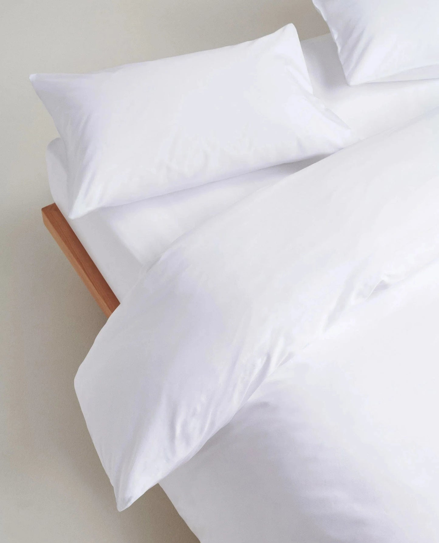 image 3 of 5 showing close-up of Rise & Fall's Soft & Smooth duvet set, colour: white, fabric: sateen cotton