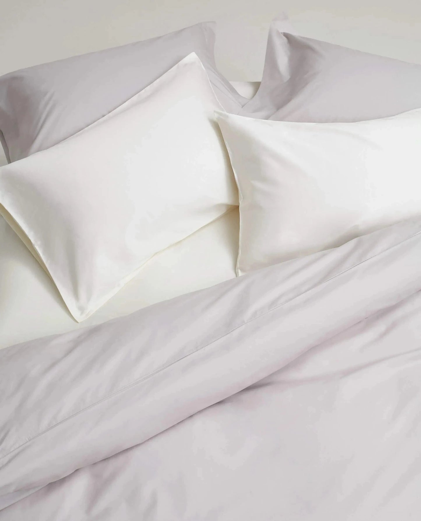 image 5 of 5 showing Rise & Fall's pebble percale cotton duvet set with white standard pillowcases