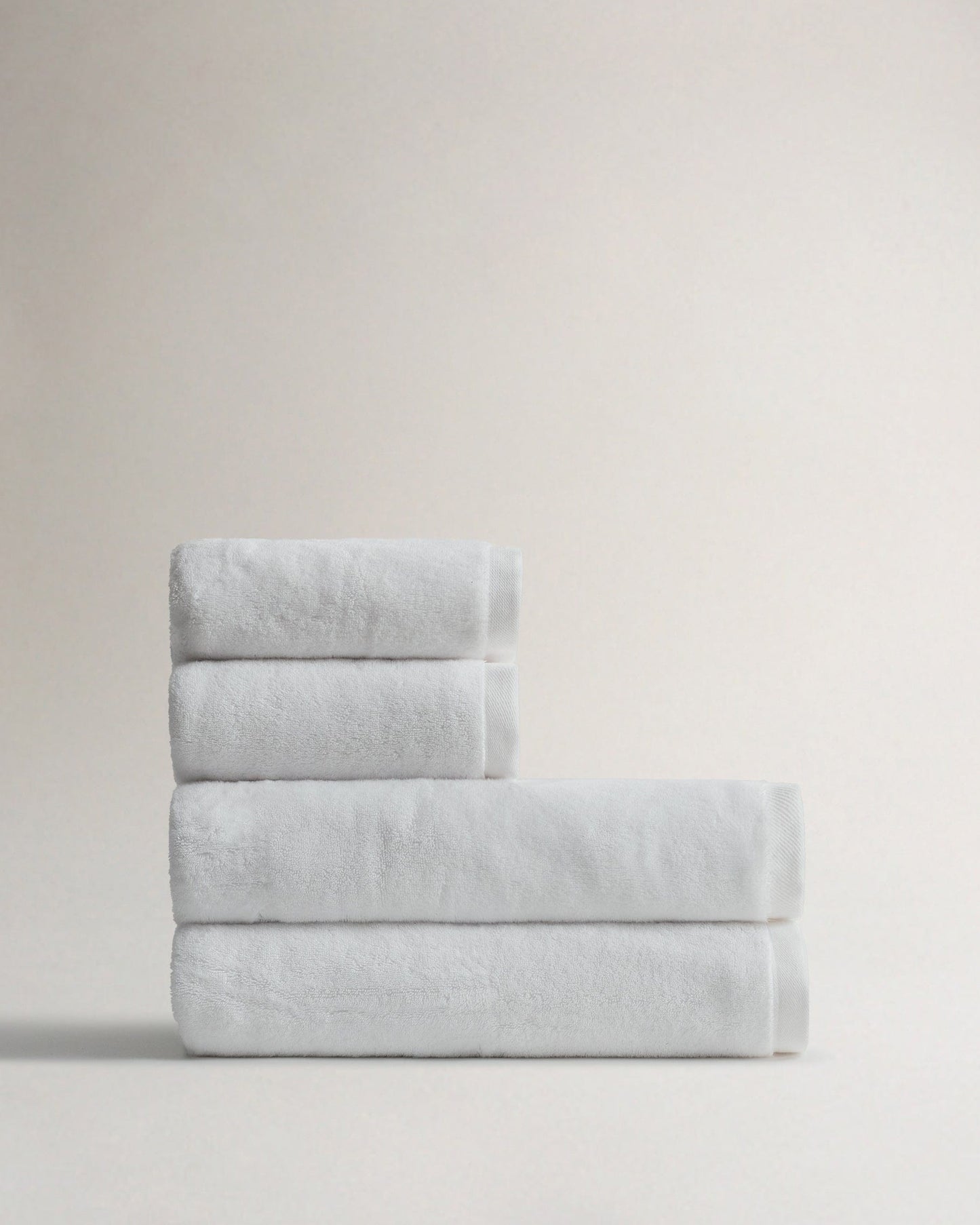 Side view of Rise & Fall's white Turkish Aegean cotton bath sheets