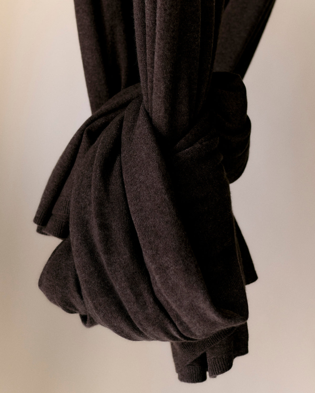 End of cashmere scarf wrapped into a ball.