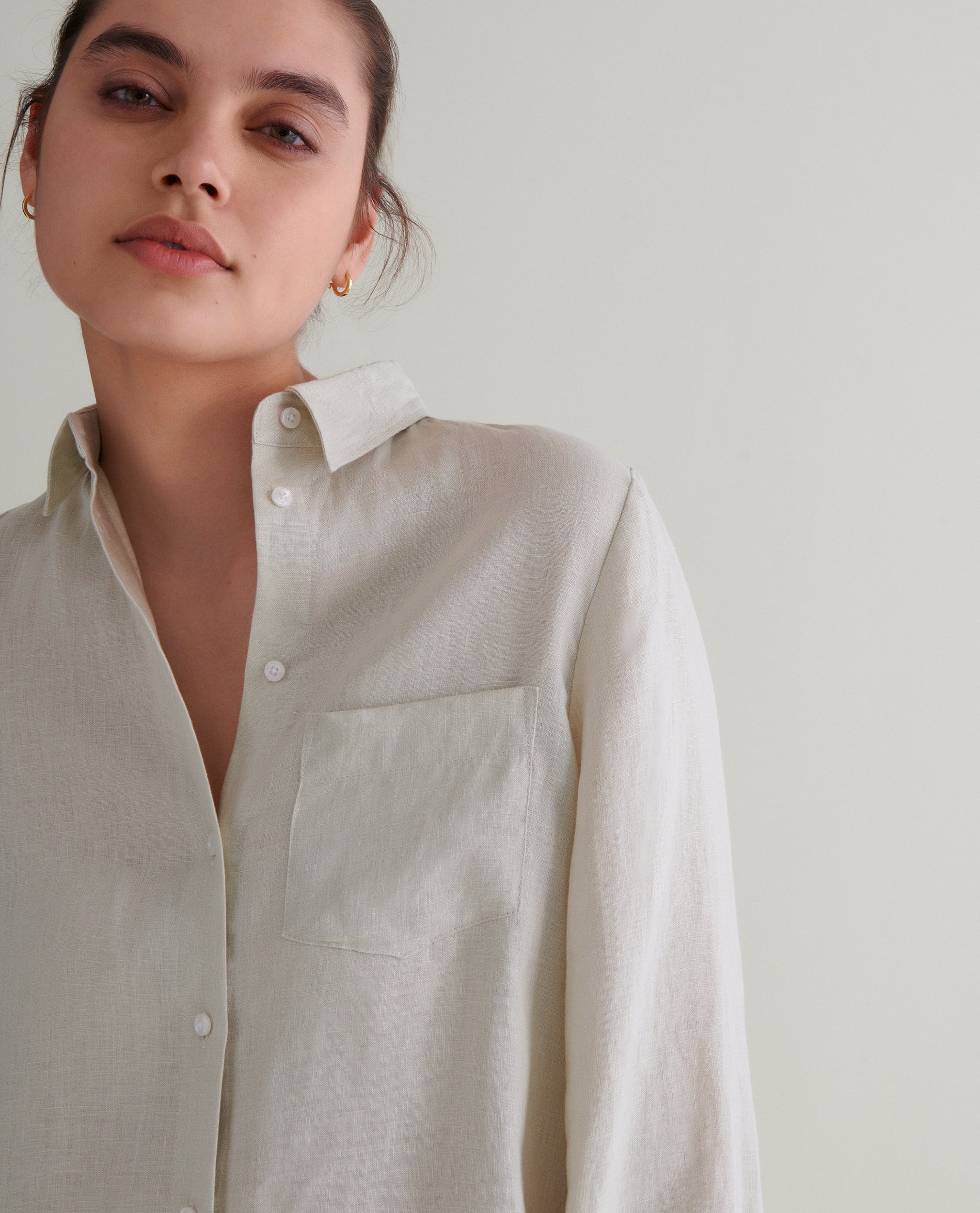 Woman Wearing A Light Beige Linen Shirt