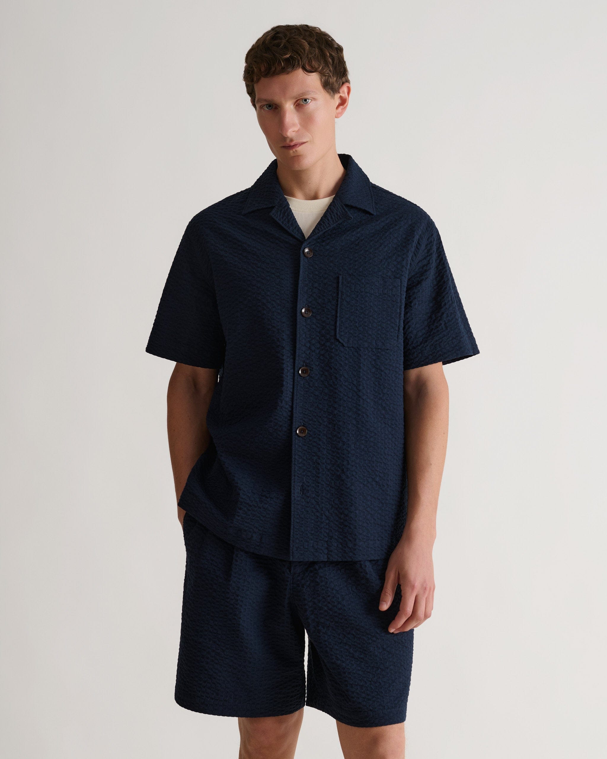 Elasticated waist with metal pin lock zip at fly