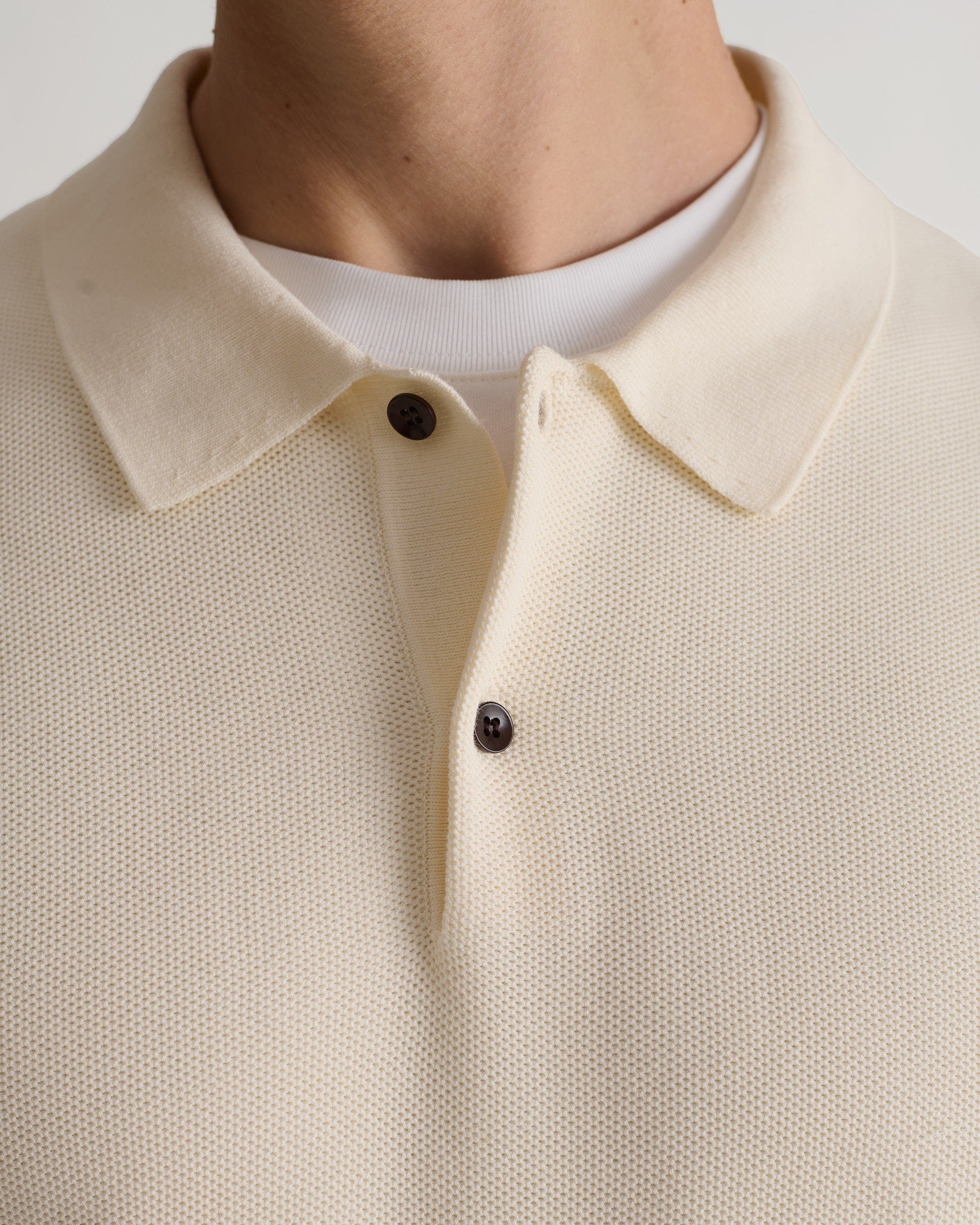 Grown-on placket with 2 buttons