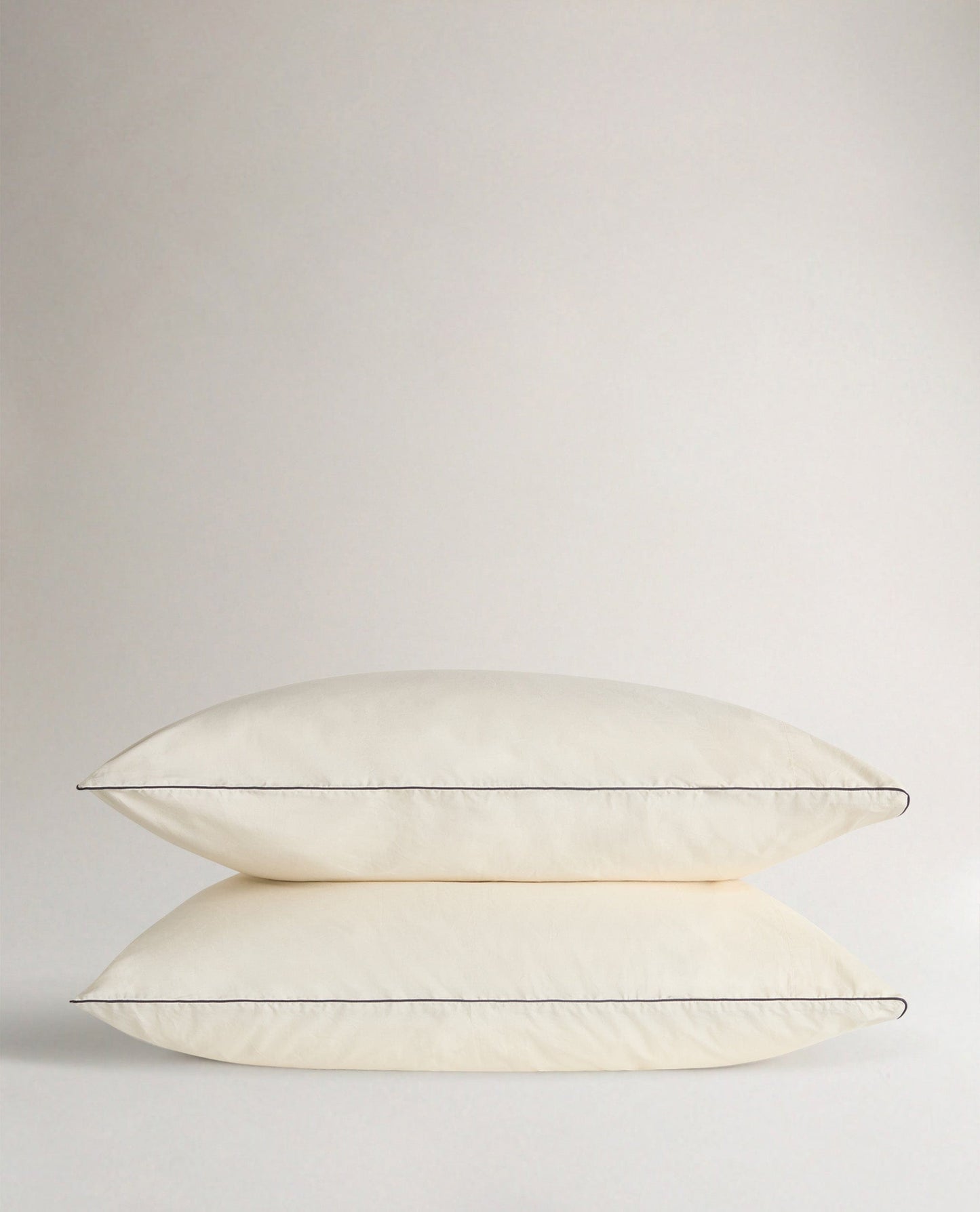 The Crisp & Cool Organic Luxury Pillowcase Set - Buttermilk Black Piping