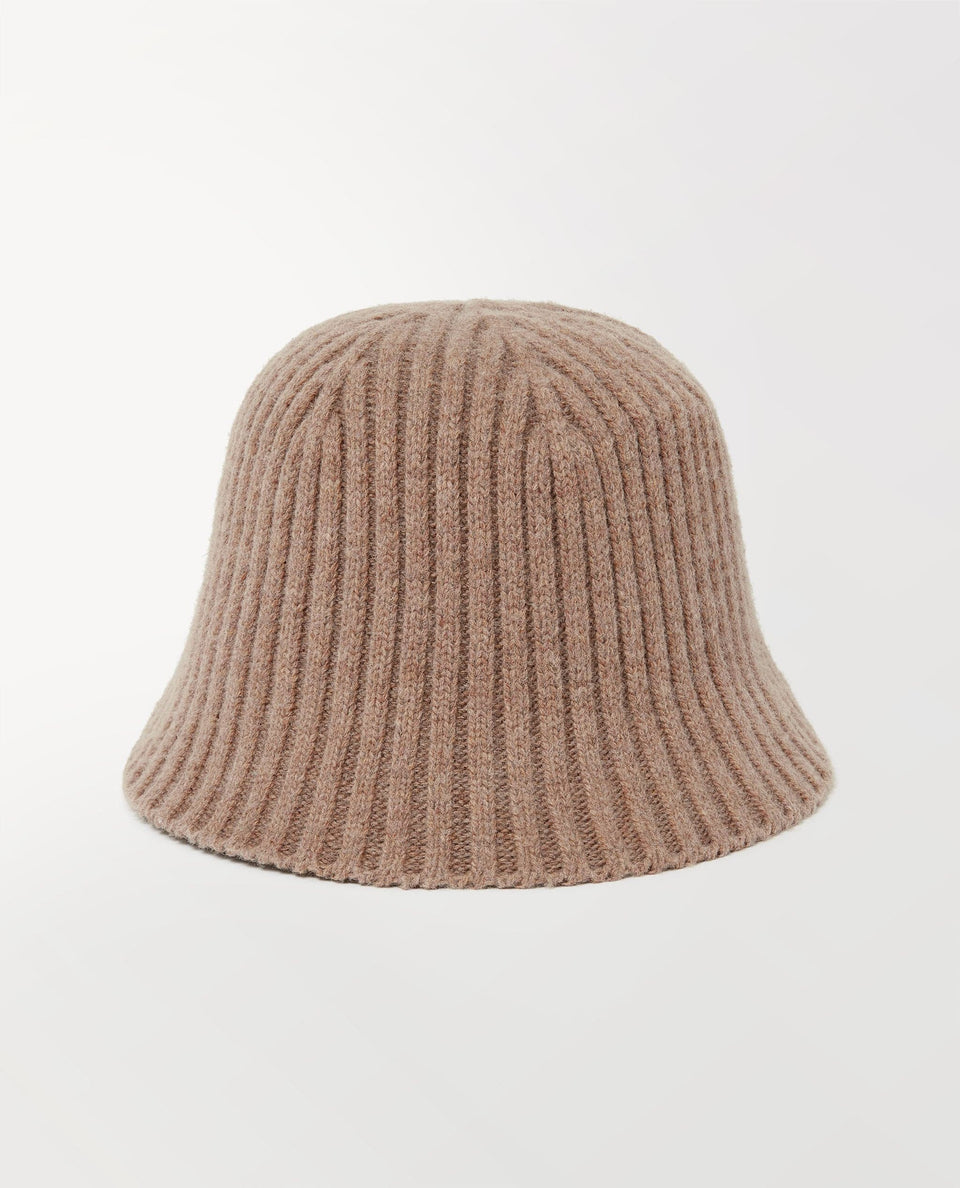 Close up of Rise & Fall's beige merino wool ribbed knit bucket hat.