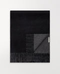 Image 1 of 2 showing Rise & Fall's finest cashmere double faced wrap, colour: black and charcoal.