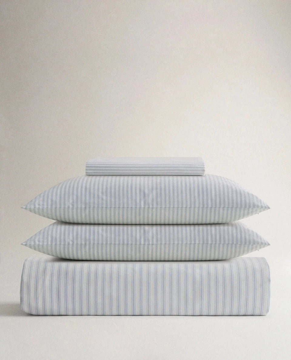 image 1 of 2 showing Rise & Fall's Crisp & Cool duvet set, colour: blue ticking stripe, fabric: percale cotton
