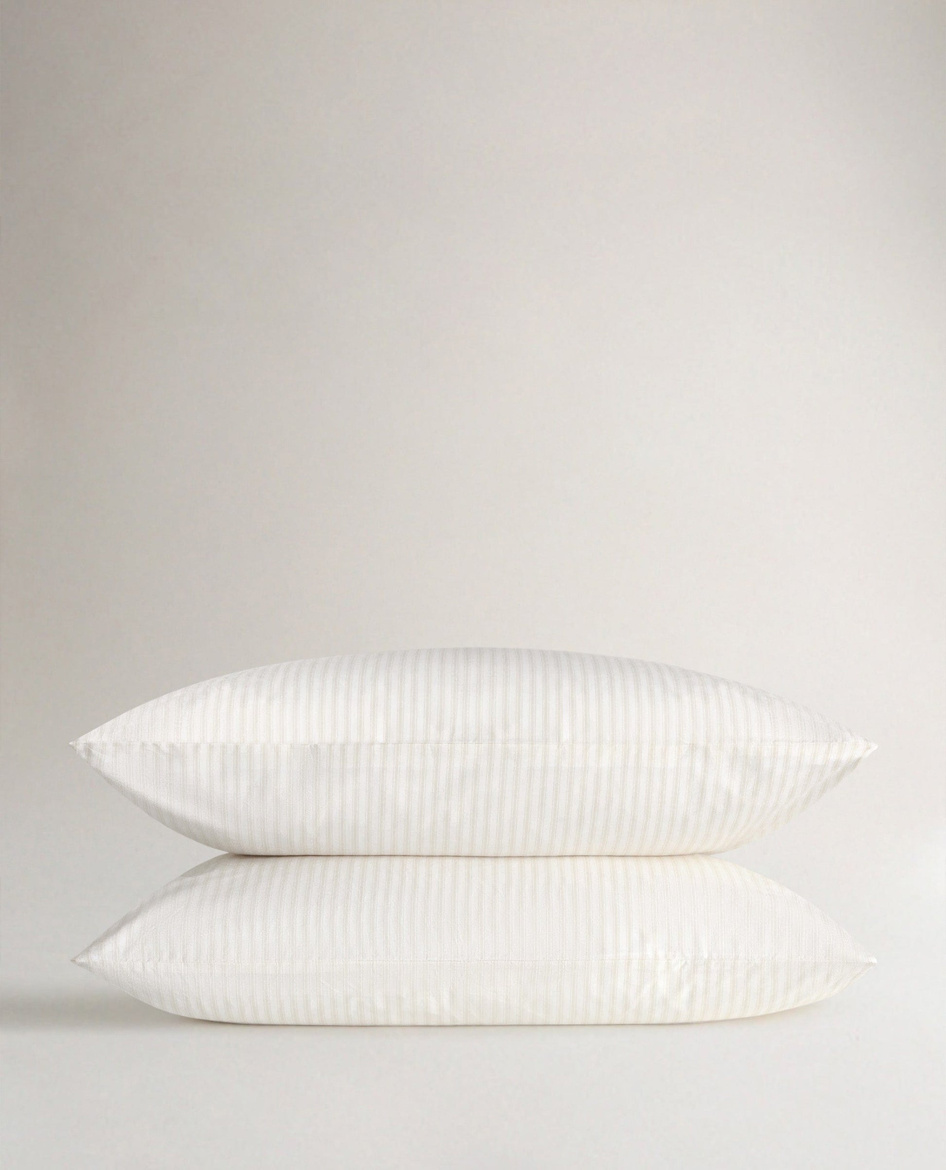 Image 1 of 3 showing Rise & Fall's Crisp & Cool Organic Cotton Pillowcases Set, colour: Buttermilk Ticking Stripe.