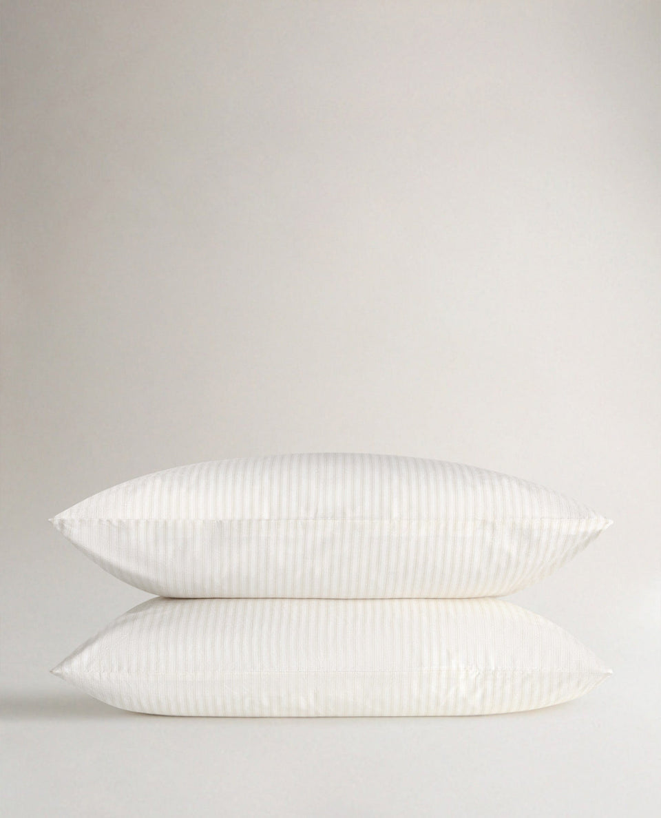Image 1 of 3 showing Rise & Fall's Crisp & Cool Organic Cotton Pillowcases Set, colour: Buttermilk Ticking Stripe.
