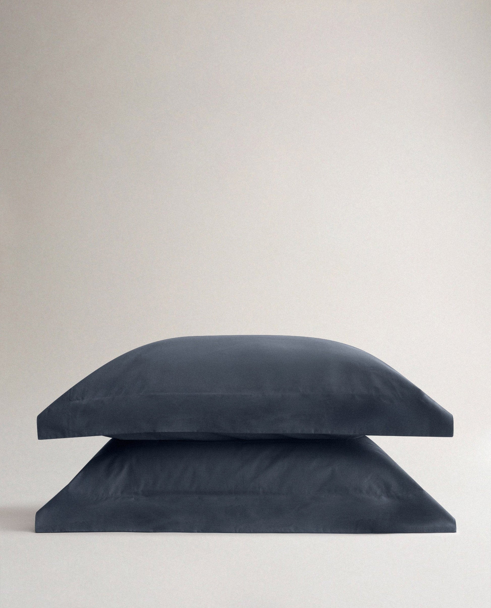 Image 1 of 3 showing Rise & Fall's Crisp & Cool Organic Cotton Oxford Pillowcase Set, colour: mood indigo.