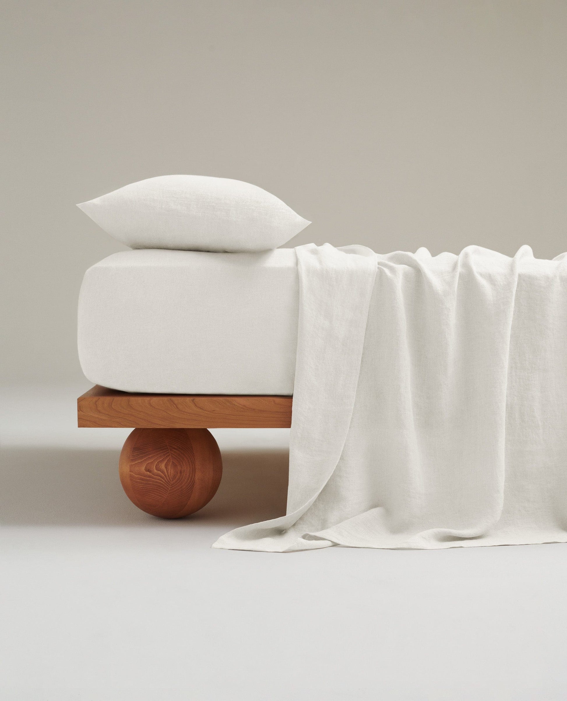 Image 1 of 3 showing Rise & Fall's Relaxed & Refined linen flat bed sheet in white.
