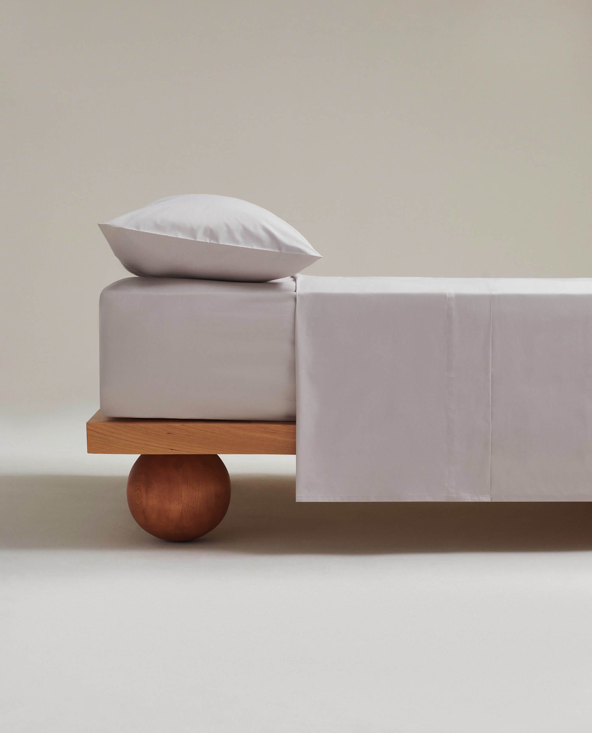 Image 1 of 3 showing Rise & Fall's Soft & Smooth organic sateen cotton flat sheet in pebble.