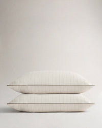 Image 1 of 3 showing Rise & Fall's Soft & Smooth Cotton Sateen Pillowcase Set in buttermilk stripe.