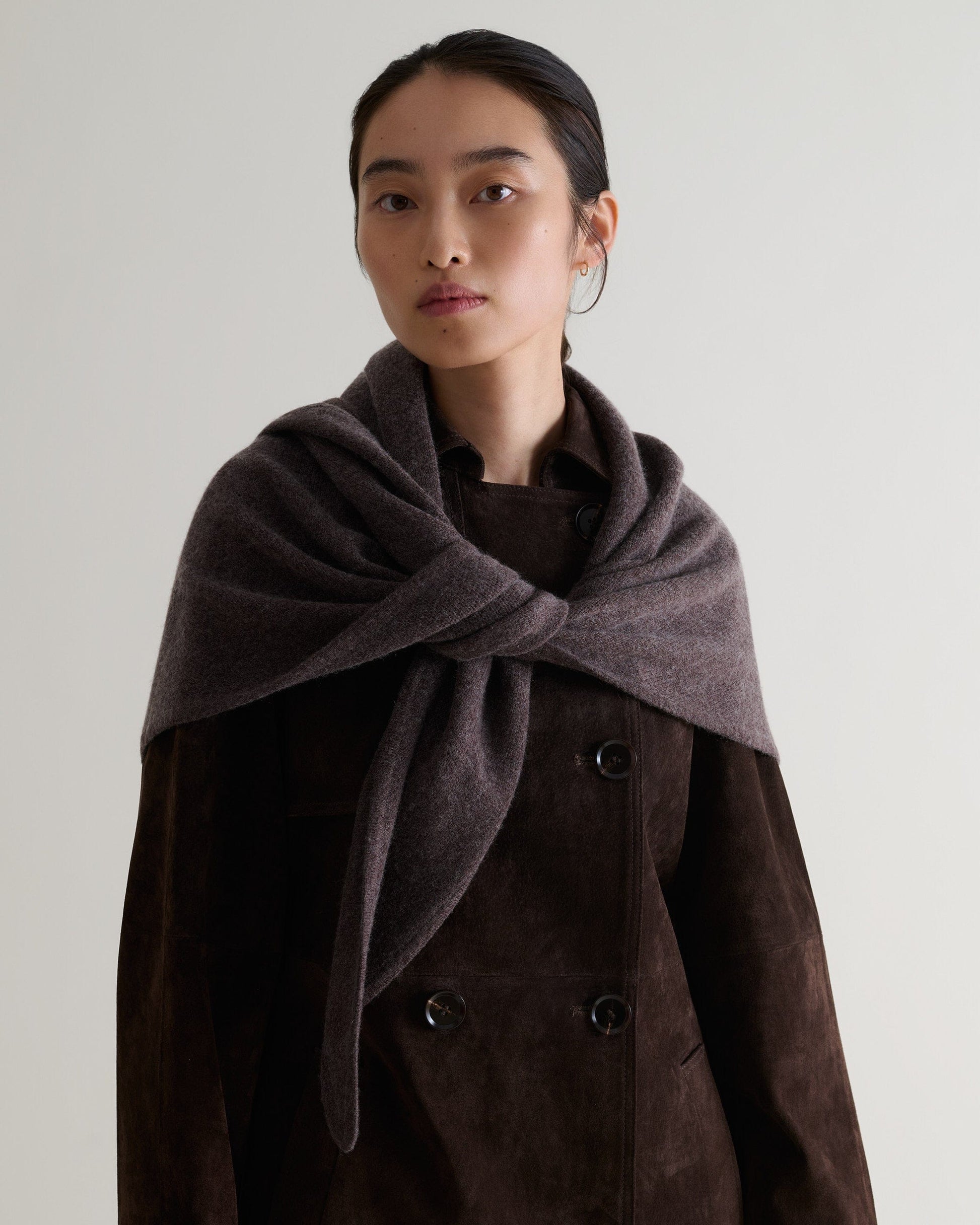 Image 1 of 3 showing woman wearing Rise & Fall's chocolate brown Cashmere Merino Bandana.