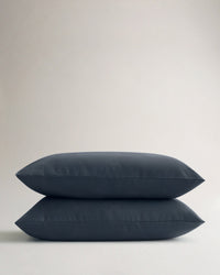 Image 1 of 4 showing Rise & Fall's Crisp & Cool Organic Cotton Percale Pillowcase Set, colour: mood indigo.