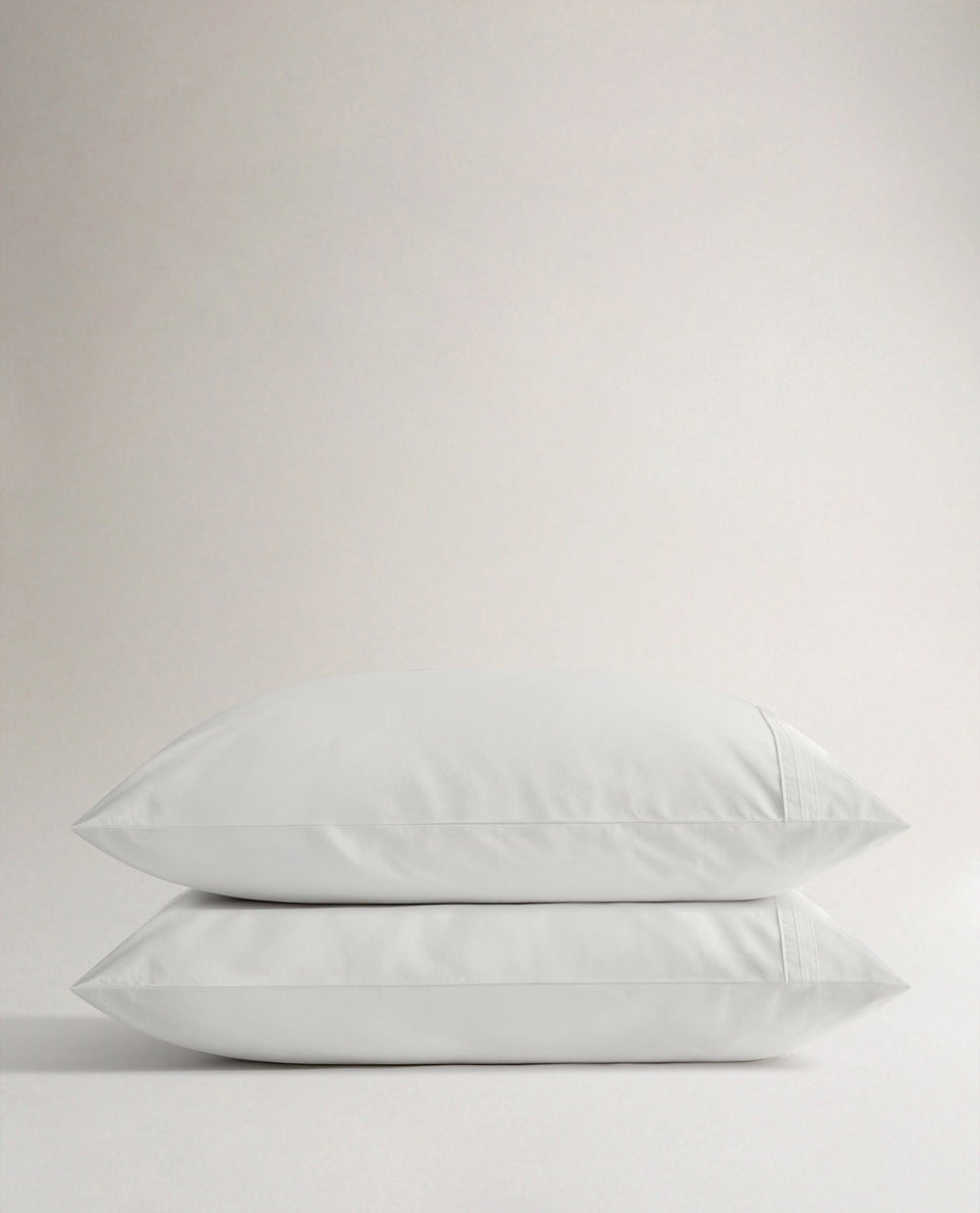 Image 1 of 4 showing Rise & Fall's Crisp & Cool Organic Cotton Pillowcase Set, colour: white tailored border.
