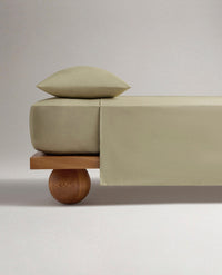 Image 1 of 4 showing Rise & Fall's Crisp & Cool organic percale cotton flat sheet in sage.