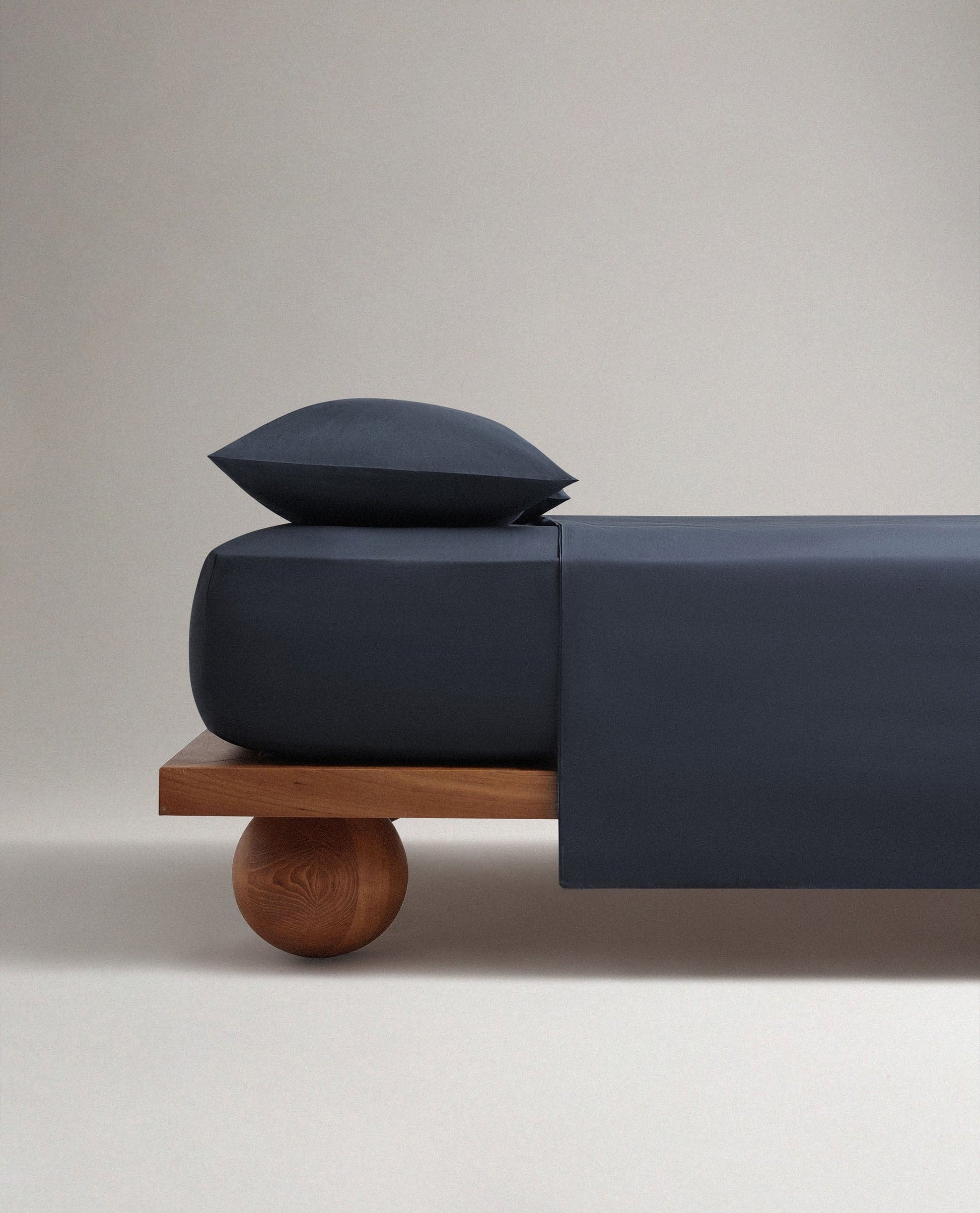 Image 1 of 4 showing Rise & Fall's Soft & Smooth organic sateen cotton flat sheet in mood indigo. 