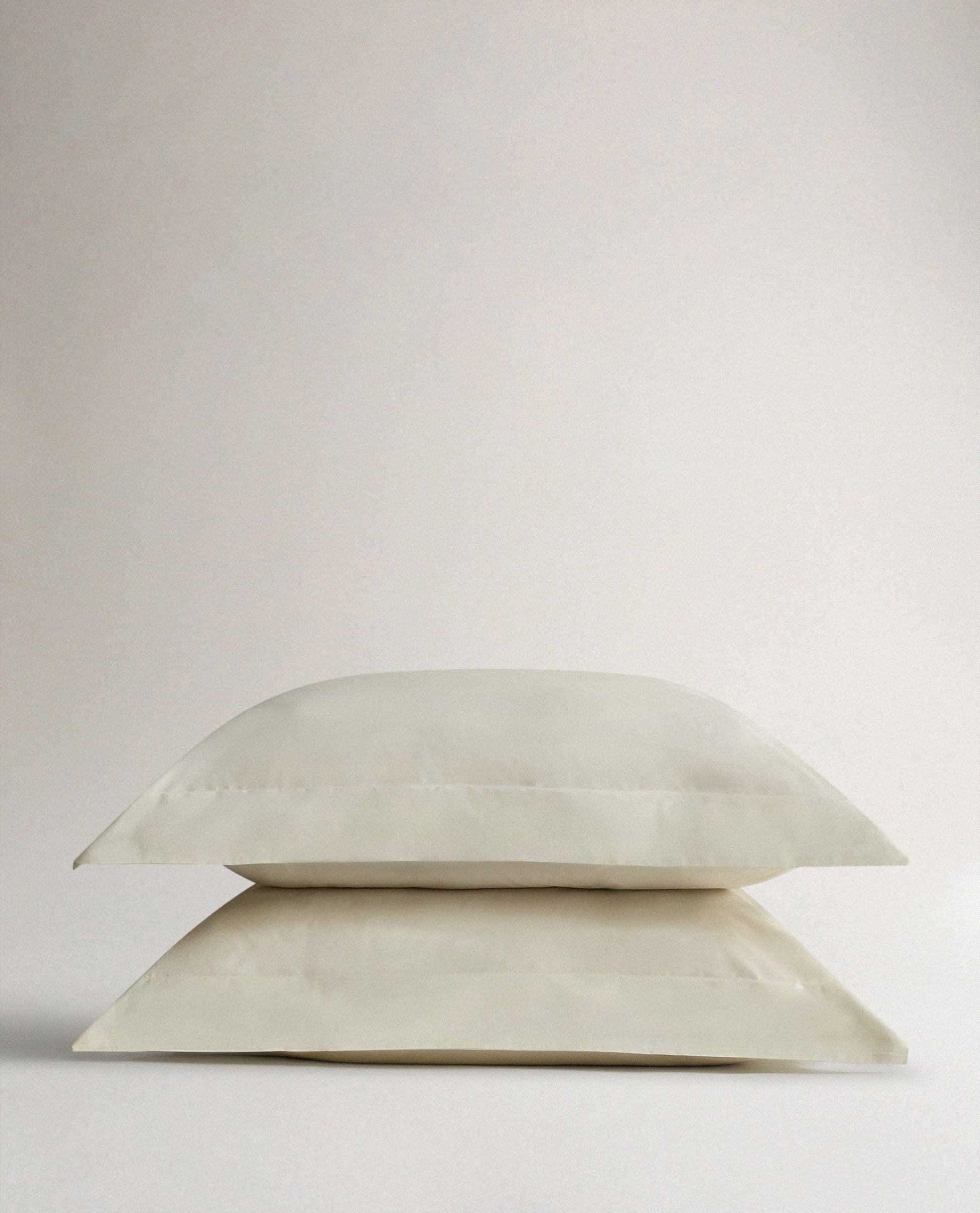 Image 1 of 5 showing Rise & Fall's Soft & Smooth Cotton Sateen Oxford Pillowcase Set in Buttermilk.