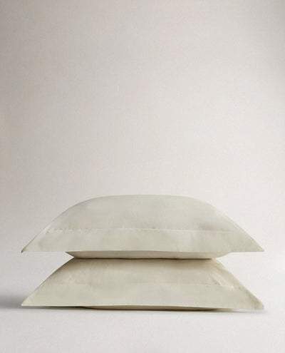 Image 1 of 5 showing Rise & Fall's Soft & Smooth Cotton Sateen Oxford Pillowcase Set in Buttermilk.