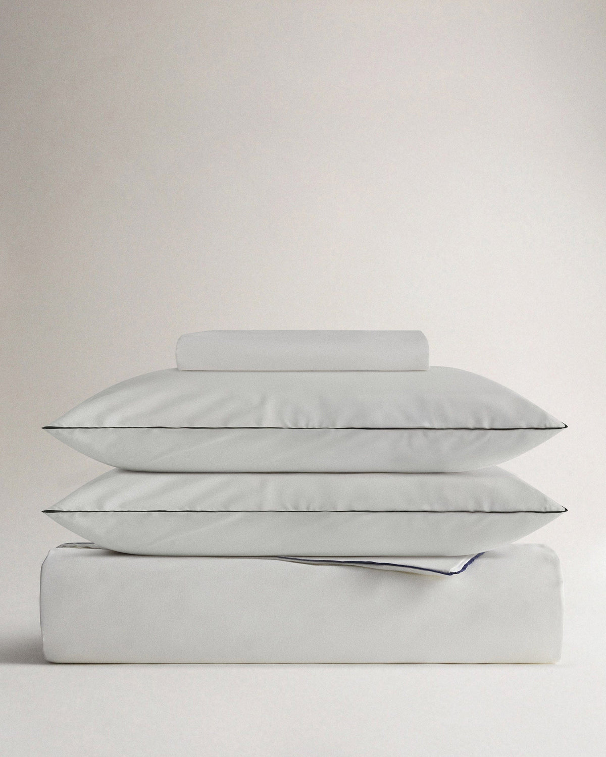 image 1 of 5 showing bed with Rise & Fall's Crisp & Cool duvet set, colour: white navy pipiing, fabric: percale cotton