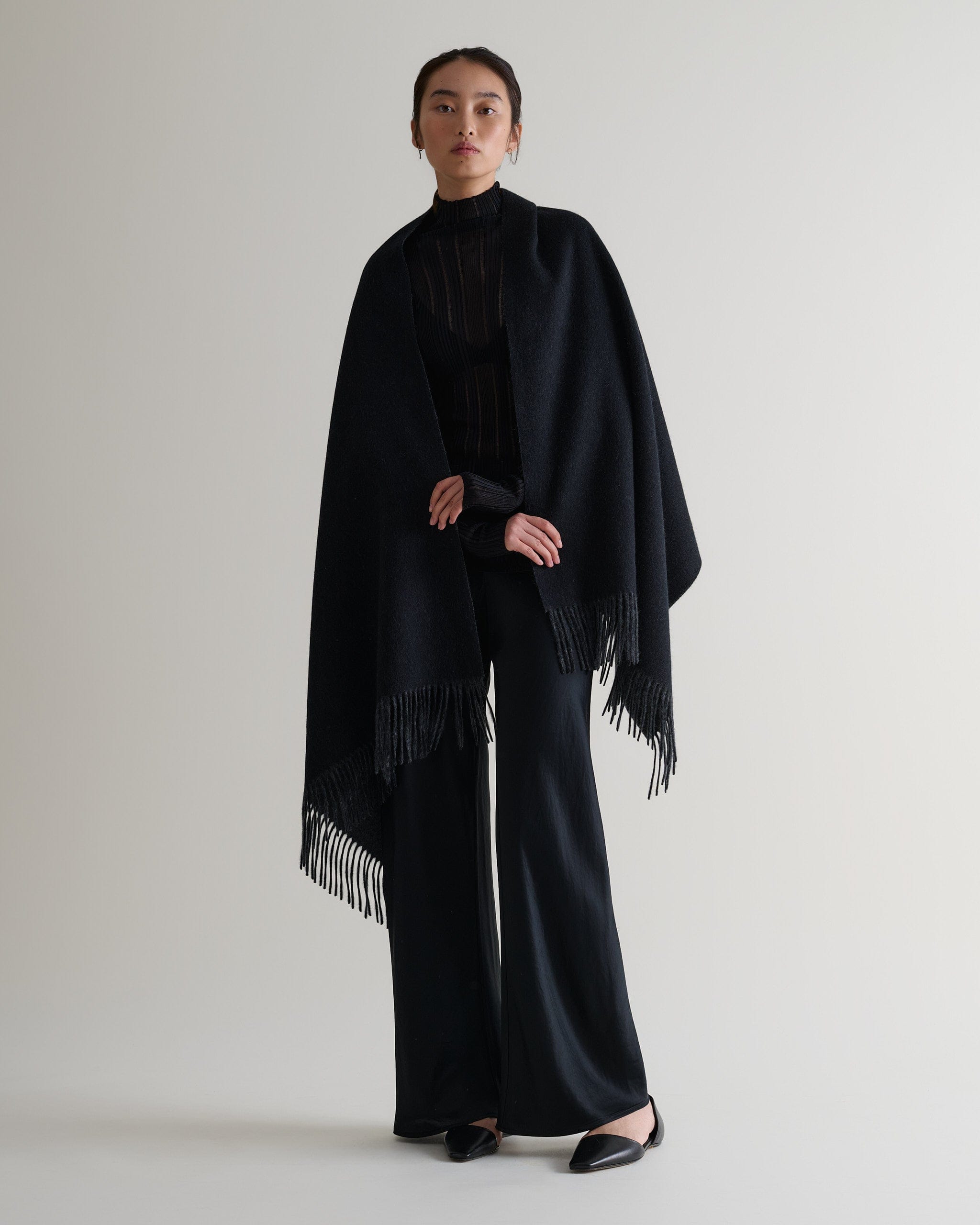 Hand-cut fringe detail