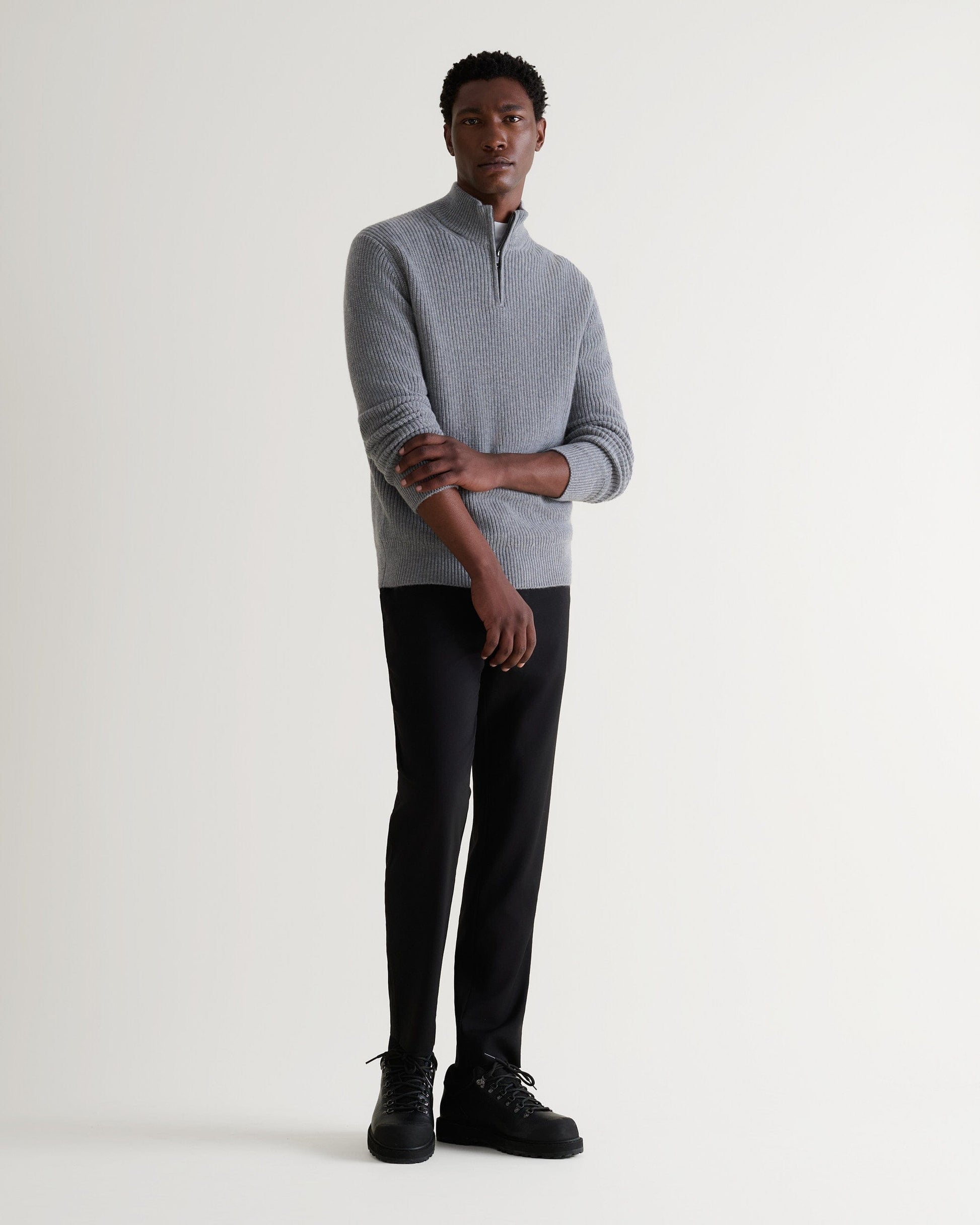 Image 1 of 6 showing man wearing Rise & Fall's Cashmere Merino Fishermans Rib 1/4 Zip Jumper in grey.