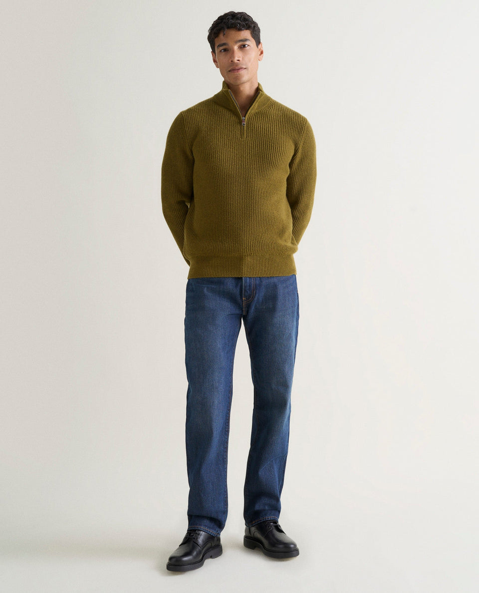 Image 1 of 6 showing man wearing Rise & Fall's Cashmere Merino Fishermans Rib 1/4 Zip Jumper in olive green.