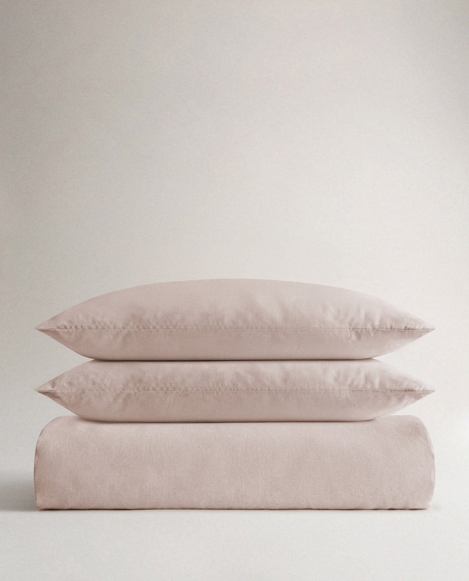 image 1 of 6 showing Rise & Fall's Relaxed & Refined linen duvet set, fabric: European flax, colour: bruised peach