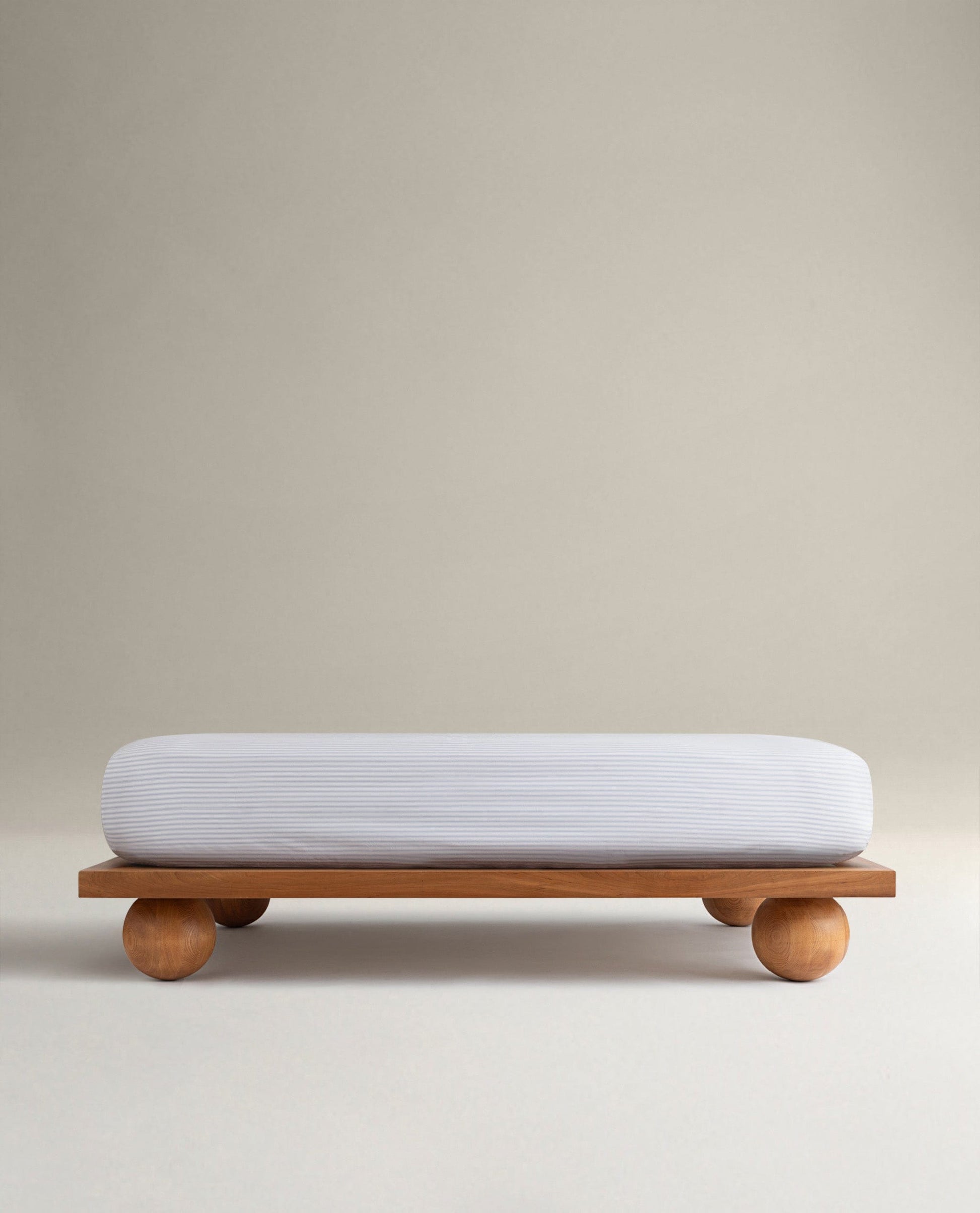 Image 1 of 6 showing Rise & Fall's Crisp & Cool organic cotton fitted sheet in blue stripe ticking.