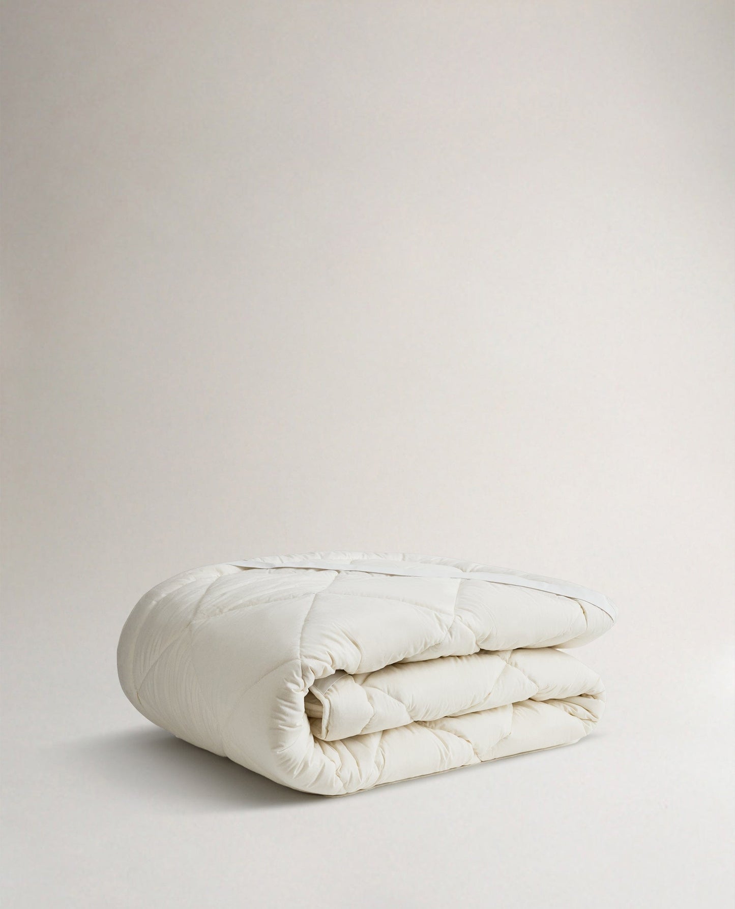 Image 2 of 2 showing Rise & Fall's  certified British Wool Mattress Topper.