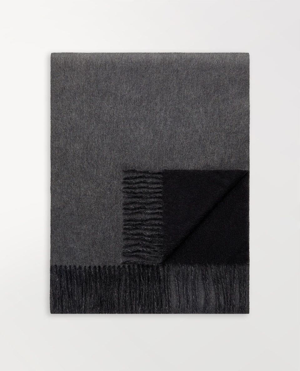 Image 2 of 2 showing Rise & Fall's finest cashmere double faced wrap, colour: charcoal and black.
