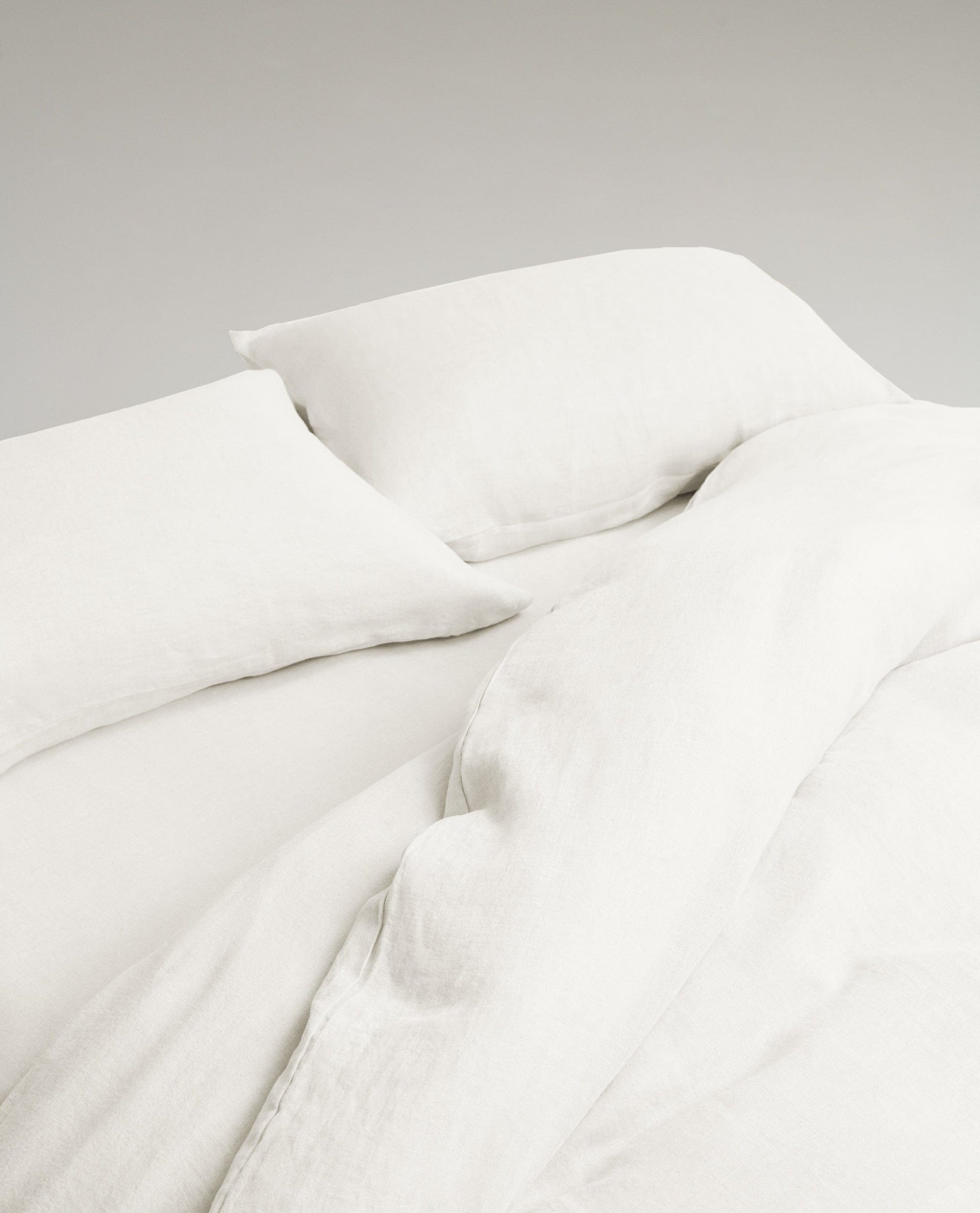 Image 2 of 3 showing Rise & Fall's Relaxed & Refined European Flax™ Linen Pillowcase Set, colour: white.