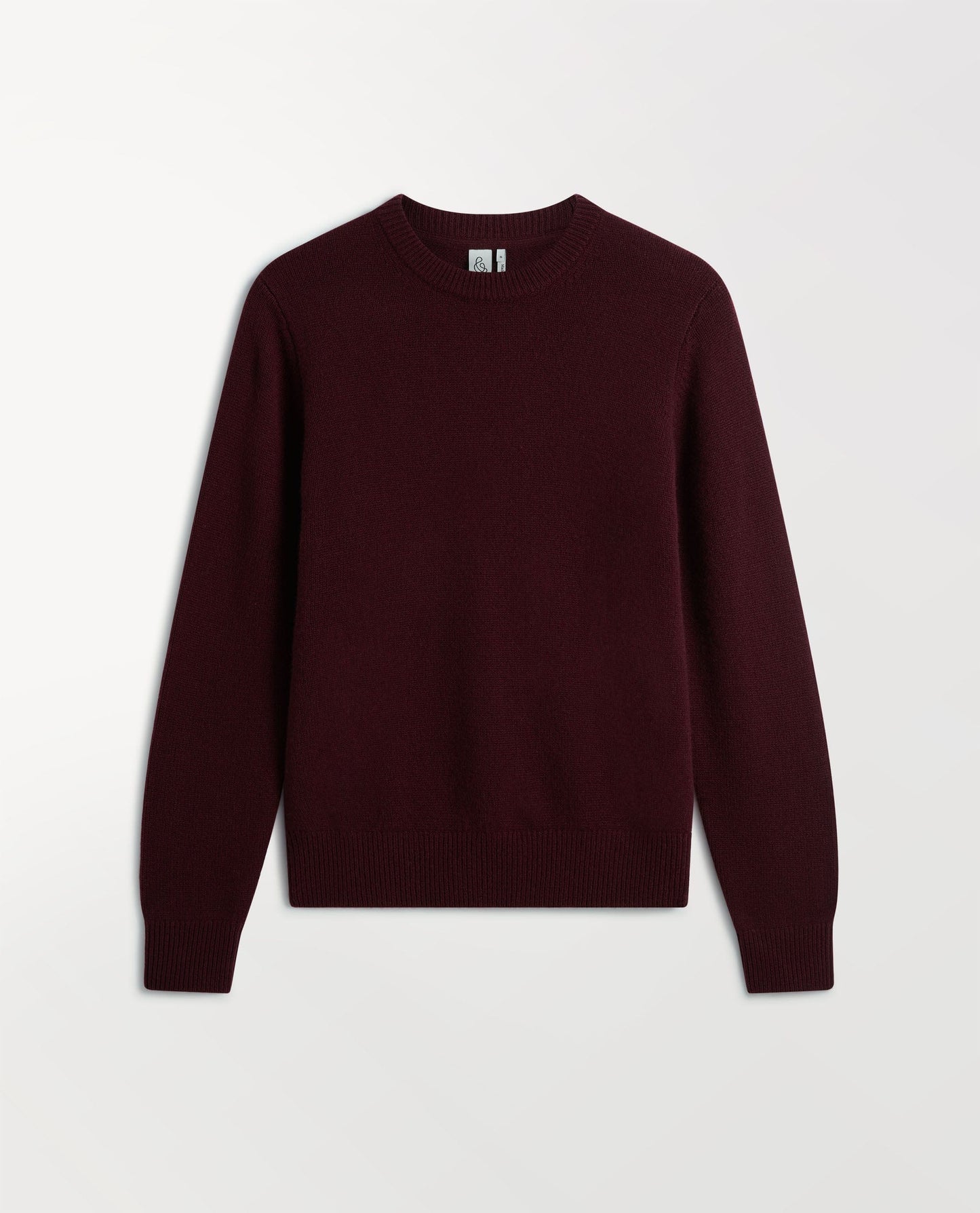 Image 2 of 3 showing Rise & Fall's oxblood mid weight cashmere crew neck jumper.