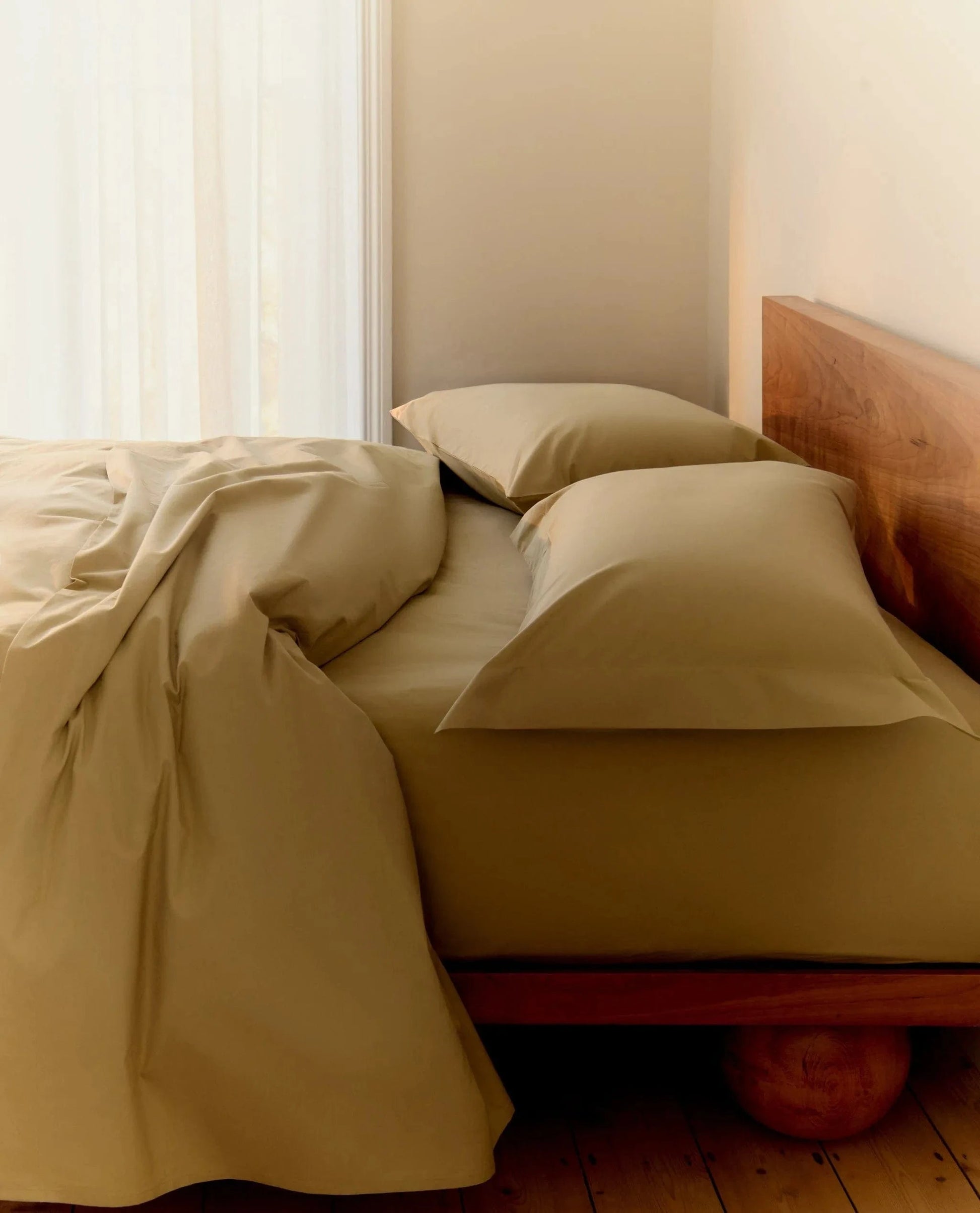 image 2 of 4 showing bed with Rise & Fall's Crisp & Cool duvet set, colour: sage, fabric: percale cotton