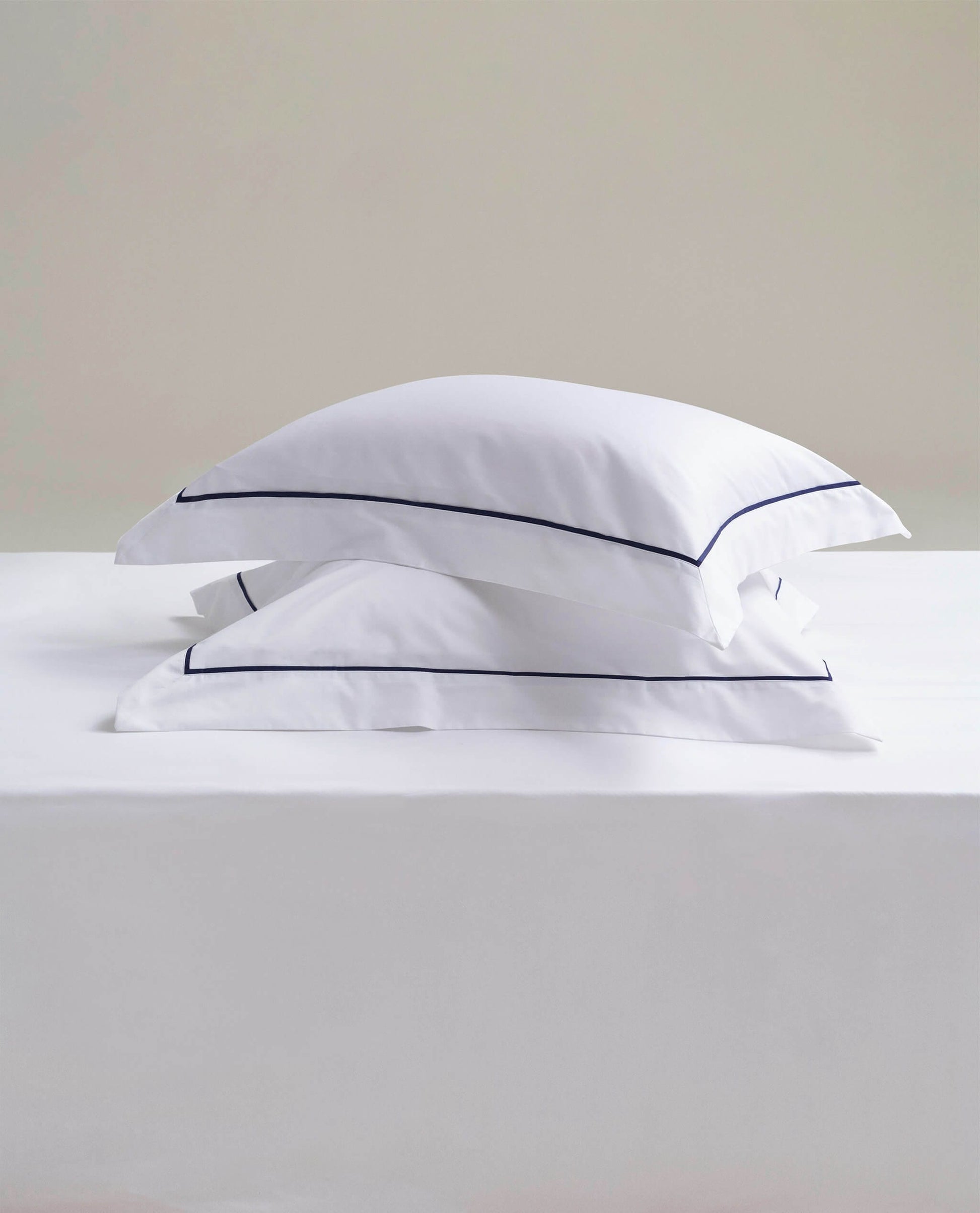Image 2 of 4 showing Rise & Fall's Crisp & Cool Organic Cotton Oxford Pillowcase Set, colour: white navy piping.