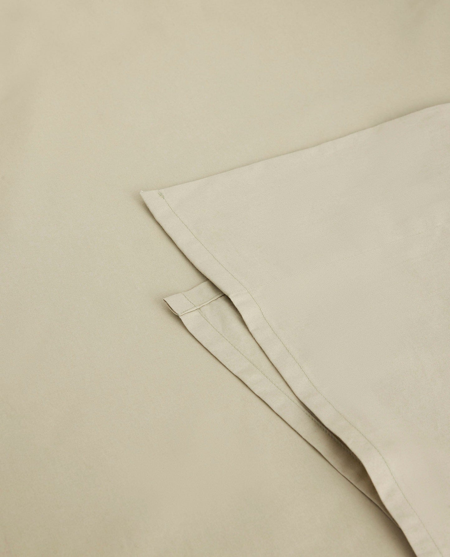 Image 2 of 4 showing Rise & Fall's Crisp & Cool organic percale cotton flat sheet in sage.