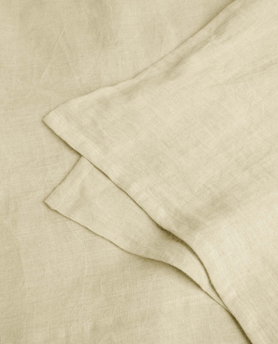 Image 2 of 4 showing Rise & Fall's House of Grey linen flat bed sheet in celery.