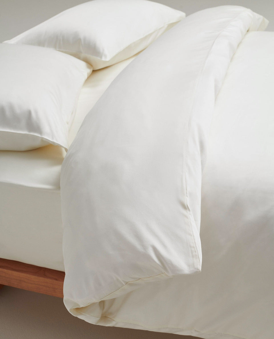 Image 2 of 5 showing Rise & Fall's sateen cotton duvet cover, colour: buttermilk.