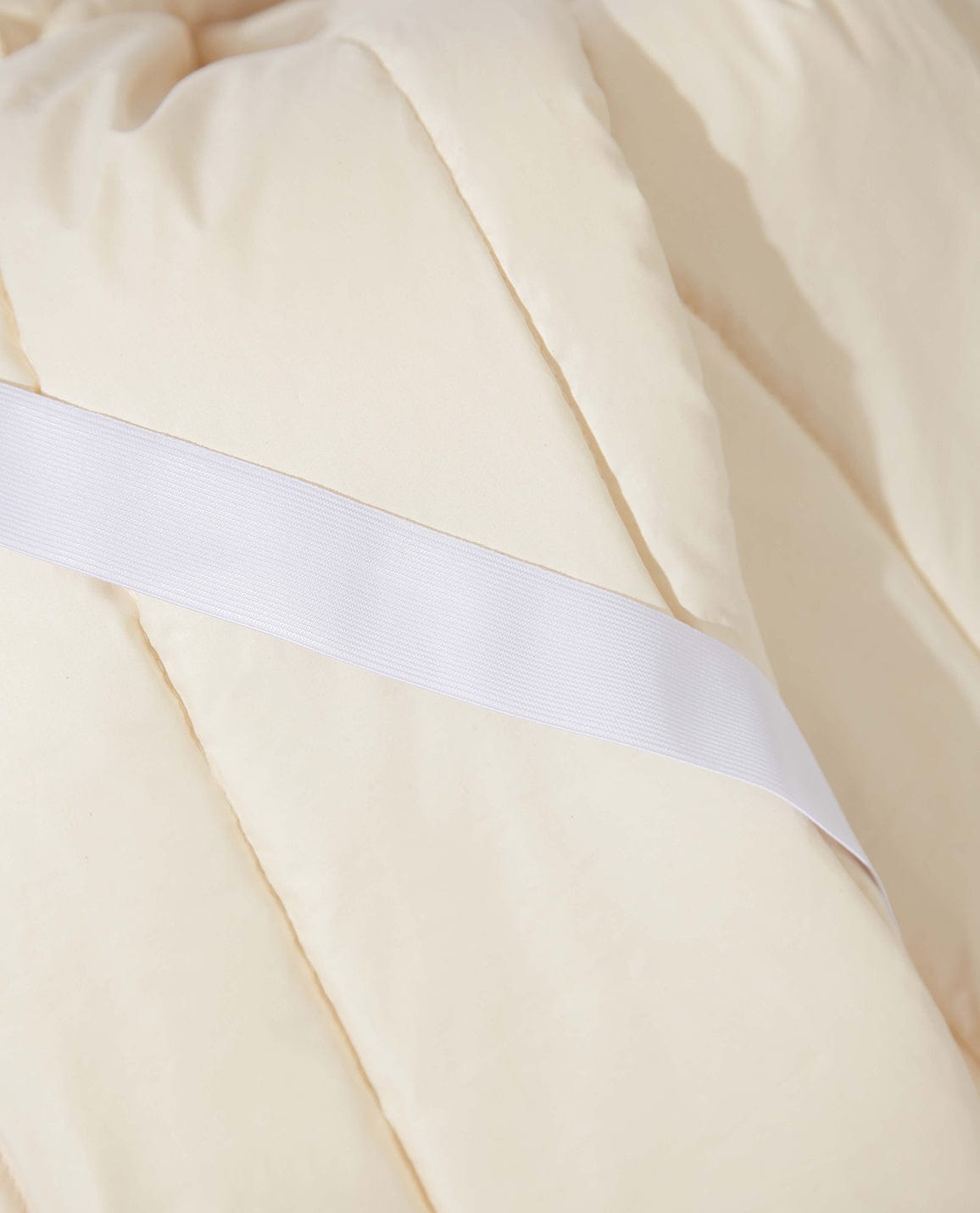 Image 2 of 5 showing Rise & Fall's certified British Wool Mattress Protector.