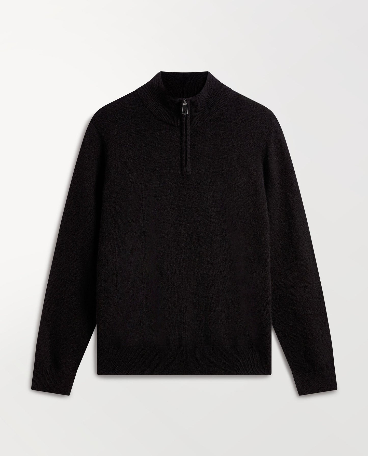 Image 2 of 5 wearing Rise & Fall's fine cashmere 1/4 zip jumper, black.